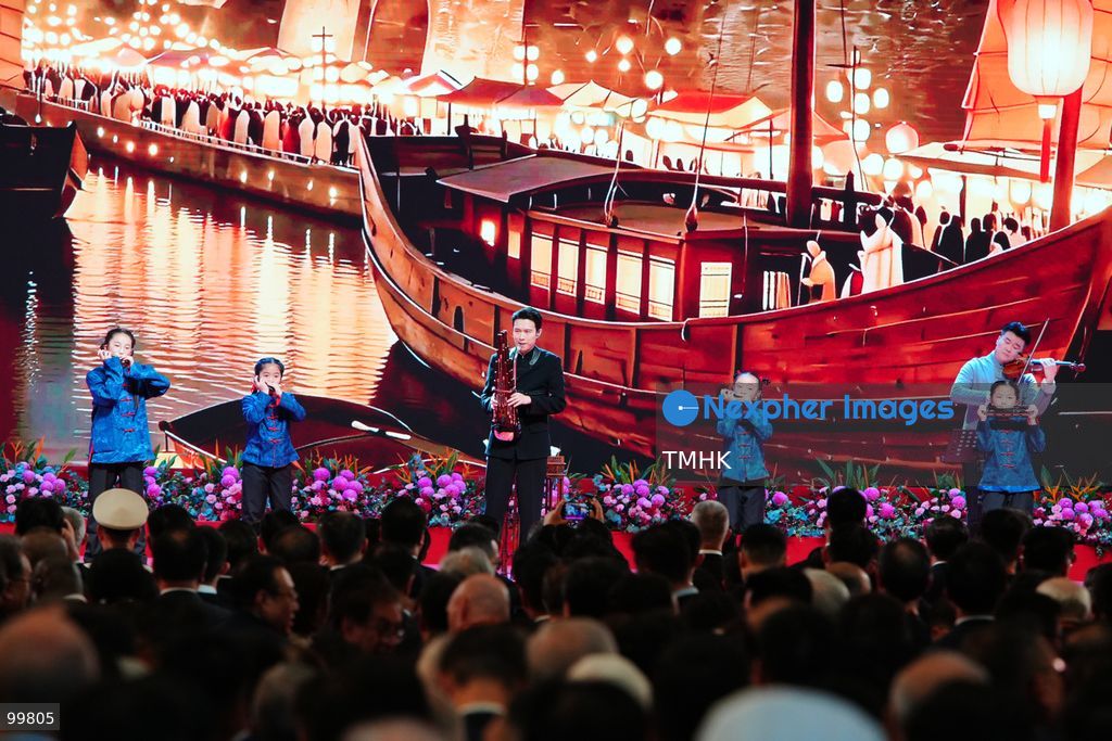 Artistes perform on stage during the cultural presentation at the official reception celebrating the 77th anniversary of the founding of the People's Republic of China in the Grand Hall of the Hong Kong Convention and Exhibition Centre on October 1, 2026 in Hong Kong. (Photo by Zulu Lo/TMHK via Nexpher Images)