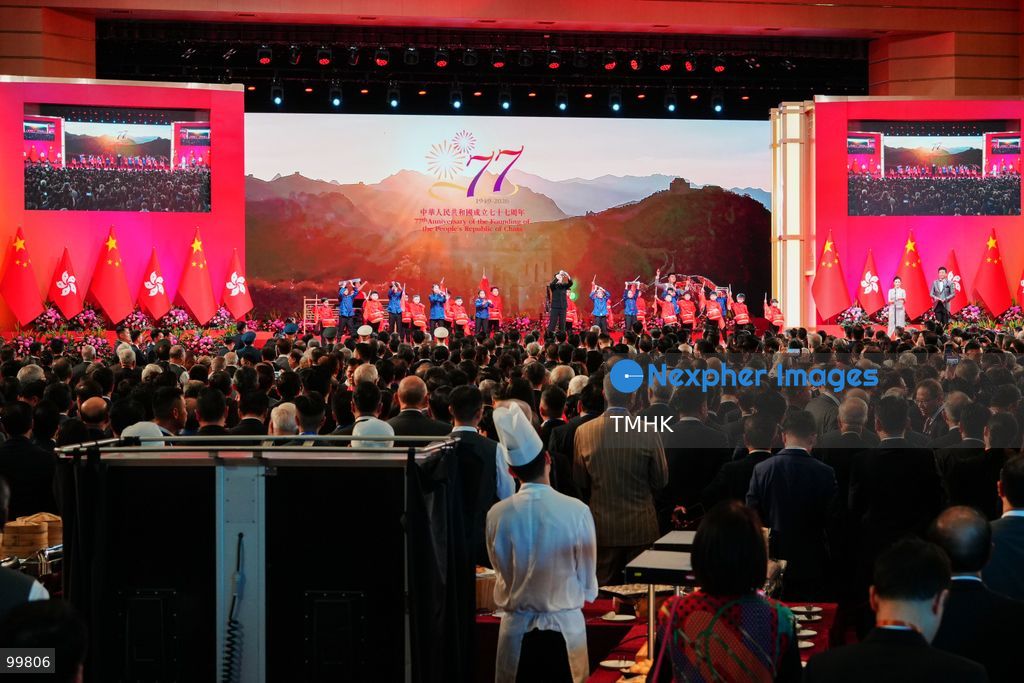 Artistes perform on stage during the cultural presentation at the official reception celebrating the 77th anniversary of the founding of the People's Republic of China in the Grand Hall of the Hong Kong Convention and Exhibition Centre on October 1, 2026 in Hong Kong. (Photo by Zulu Lo/TMHK via Nexpher Images)