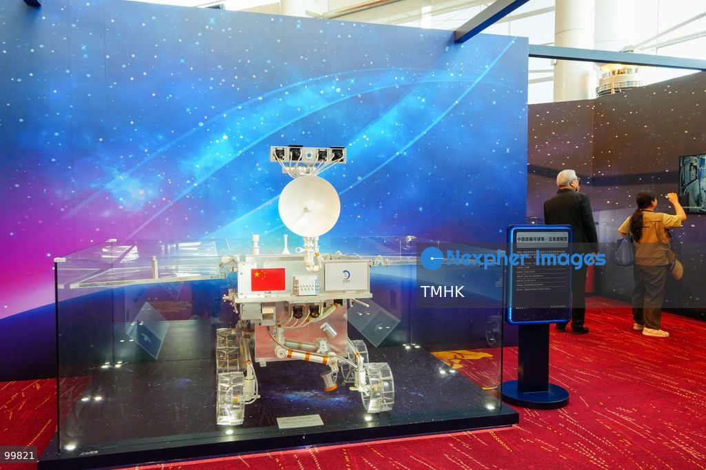 A general view shows an exhibition showcasing China's aerospace achievements and space station missions set up in the foyer outside the Grand Hall of the Hong Kong Convention and Exhibition Centre during the 77th National Day reception on October 1, 2026 in Hong Kong. (Photo by Zulu Lo/TMHK via Nexpher Images)
