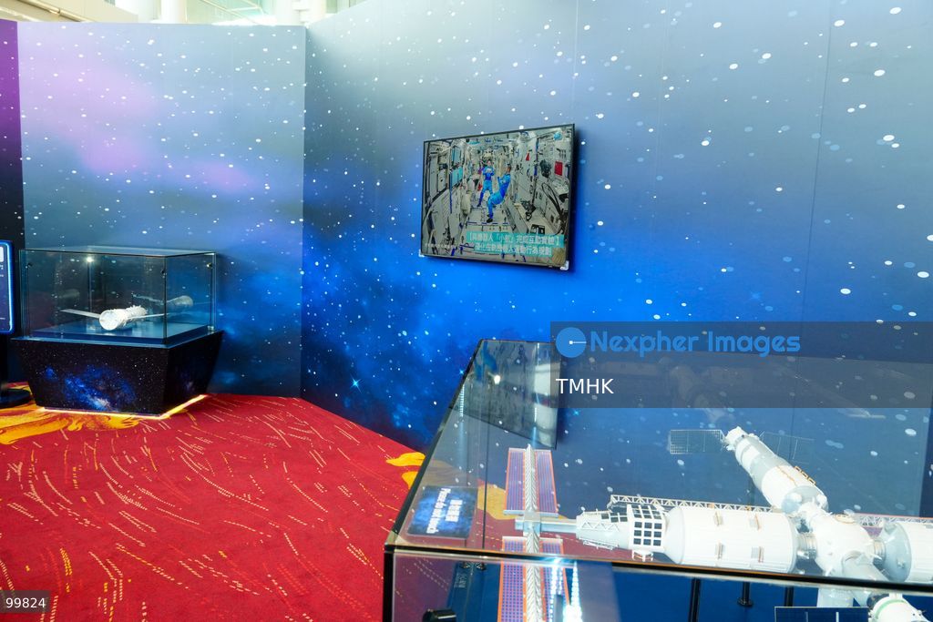 A general view shows an exhibition showcasing China's aerospace achievements and space station missions set up in the foyer outside the Grand Hall of the Hong Kong Convention and Exhibition Centre during the 77th National Day reception on October 1, 2026 in Hong Kong. (Photo by Zulu Lo/TMHK via Nexpher Images)
