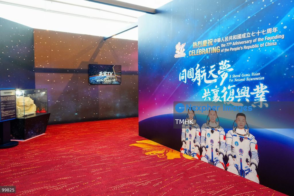 A general view shows an exhibition showcasing China's aerospace achievements and space station missions set up in the foyer outside the Grand Hall of the Hong Kong Convention and Exhibition Centre during the 77th National Day reception on October 1, 2026 in Hong Kong. (Photo by Zulu Lo/TMHK via Nexpher Images)