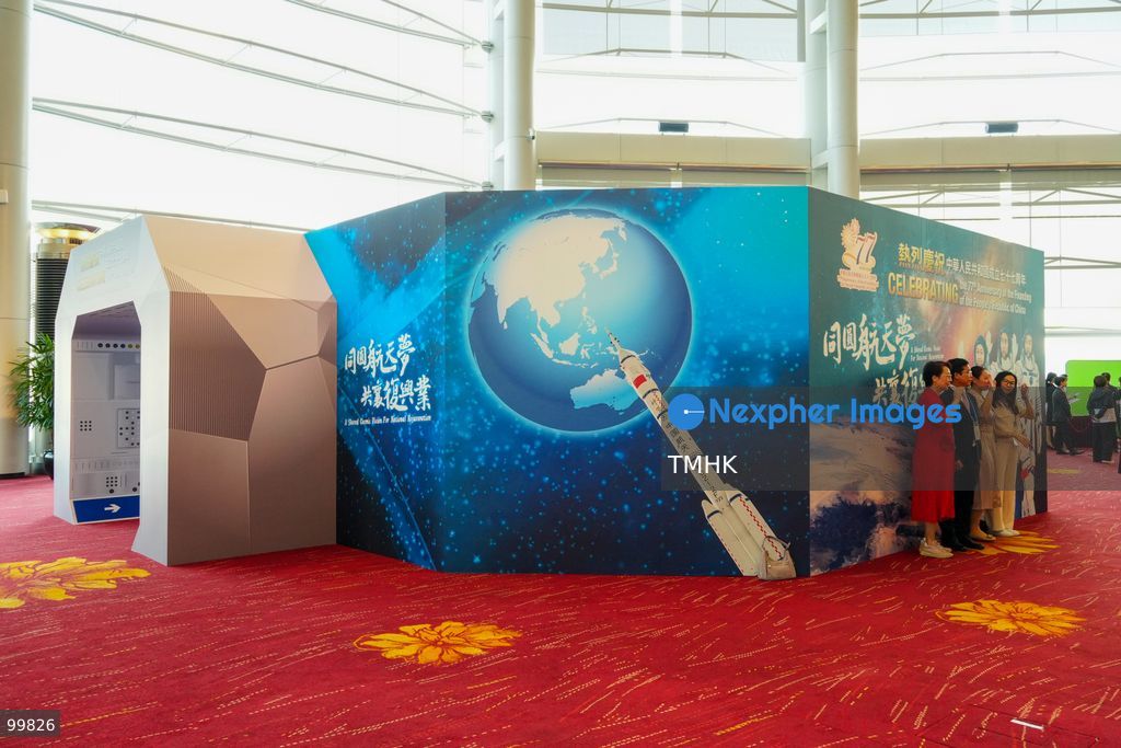 A general view shows an exhibition showcasing China's aerospace achievements and space station missions set up in the foyer outside the Grand Hall of the Hong Kong Convention and Exhibition Centre during the 77th National Day reception on October 1, 2026 in Hong Kong. (Photo by Zulu Lo/TMHK via Nexpher Images)