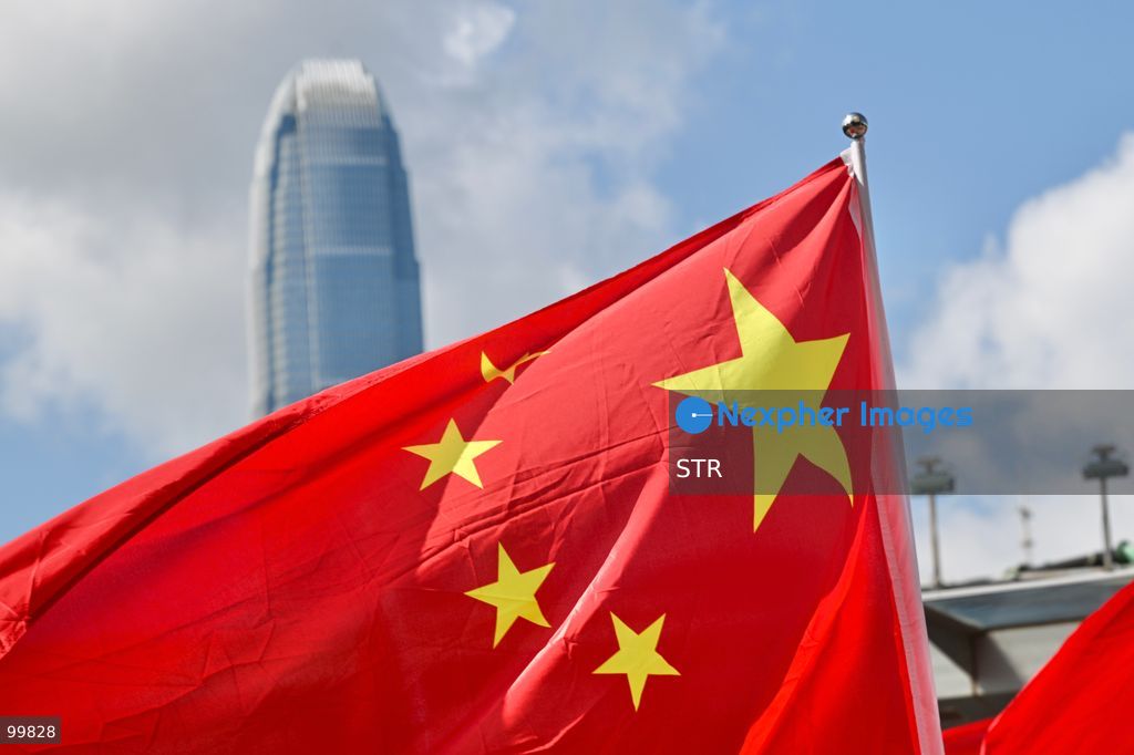A general view showing a national flag of China and Hong Kong International Finance Centre building on October 1, 2026 in Hong Kong. Today is the China's National Day. (Photo by STR/Nexpher Images)