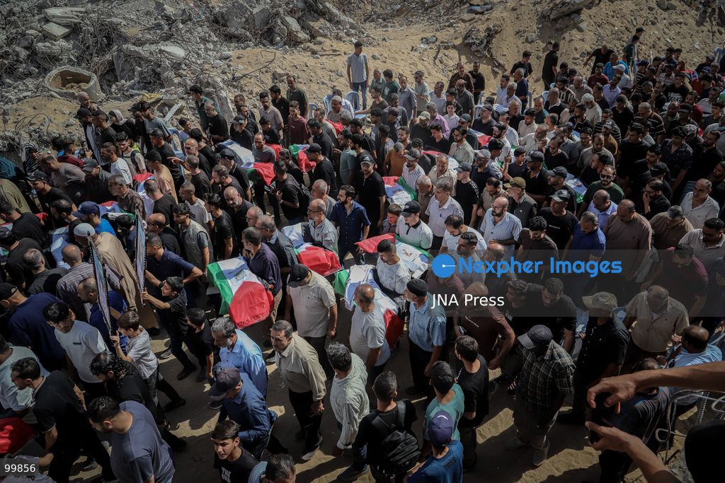 GAZA CITY, GAZA STRIP, OCTOBER 1, 2026: Palestinian families bid farewell to the remains of 105 Palestinians whose bodies were recovered from beneath the rubble of the Al-Taj residential area in Gaza City. The victims were killed in Israeli airstrikes on October 25, 2023, when residential buildings in the Yarmouk area were destroyed. Gaza Civil Defense teams recovered the bodies and remains after a 17-day search operation carried out in coordination with an Egyptian committee. Families gathered to identify their relatives and pay their final respects before burial. Photo by Mohammed M. Skaik / JNA Press. (Photo by Mohammed M Skaik/JNA Press via Nexpher Images)
