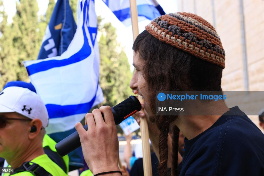 JERUSALEM, ISRAEL, OCTOBER 1, 2026: Activists protest outside the Israeli Supreme Court against the disqualification of Arab political parties and candidates from the upcoming parliamentary elections. The court began hearings on appeals against decisions by the Central Elections Committee to disqualify the Ra'am and Joint List parties, as well as candidates Ofer Cassif and Sami Abu Shehadeh. National Security Minister Itamar Ben-Gvir, whose party sought the disqualification of Abu Shehadeh, also arrived at the court as supporters and opponents gathered outside. Photo by Jacob Middleburgh / JNA Press (Photo by Jacob Middleburgh/JNA Press via Nexpher Images)