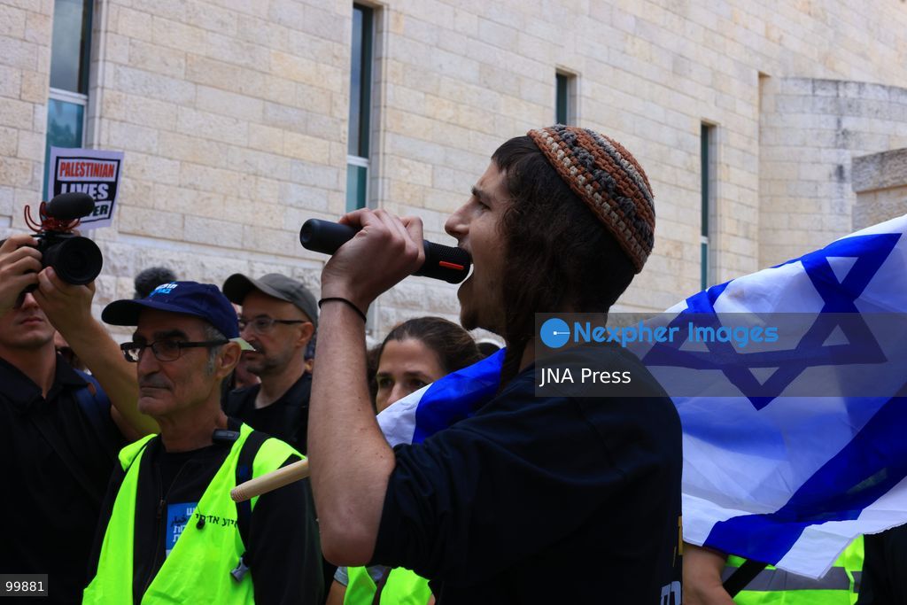 JERUSALEM, ISRAEL, OCTOBER 1, 2026: Activists protest outside the Israeli Supreme Court against the disqualification of Arab political parties and candidates from the upcoming parliamentary elections. The court began hearings on appeals against decisions by the Central Elections Committee to disqualify the Ra'am and Joint List parties, as well as candidates Ofer Cassif and Sami Abu Shehadeh. National Security Minister Itamar Ben-Gvir, whose party sought the disqualification of Abu Shehadeh, also arrived at the court as supporters and opponents gathered outside. Photo by Jacob Middleburgh / JNA Press (Photo by Jacob Middleburgh/JNA Press via Nexpher Images)