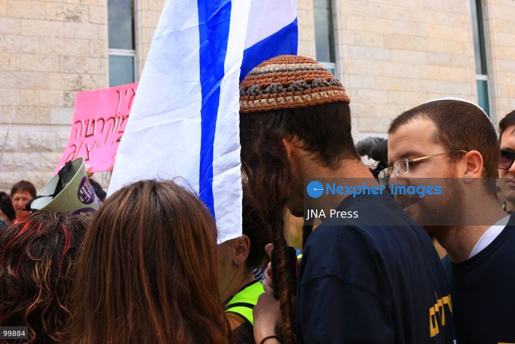 JERUSALEM, ISRAEL, OCTOBER 1, 2026: Activists protest outside the Israeli Supreme Court against the disqualification of Arab political parties and candidates from the upcoming parliamentary elections. The court began hearings on appeals against decisions by the Central Elections Committee to disqualify the Ra'am and Joint List parties, as well as candidates Ofer Cassif and Sami Abu Shehadeh. National Security Minister Itamar Ben-Gvir, whose party sought the disqualification of Abu Shehadeh, also arrived at the court as supporters and opponents gathered outside. Photo by Jacob Middleburgh / JNA Press (Photo by Jacob Middleburgh/JNA Press via Nexpher Images)
