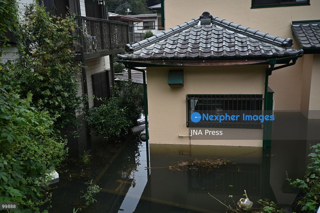 CHIBA, JAPAN, OCTOBER 1, 2026: Flooding affects a residential area in Chiba after heavy rains associated with Typhoon No. 25 caused a long-neglected embankment to collapse, blocking a drainage channel. With another typhoon approaching, residents face continued flooding as restoration work has yet to be completed. Photo by Soichiro Koriyama / JNA Press. (Photo by Soichiro Koriyama/JNA Press via Nexpher Images)