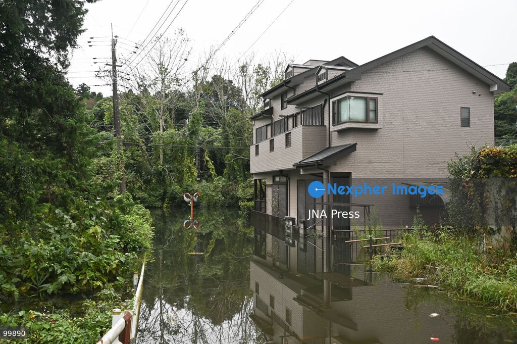 CHIBA, JAPAN, OCTOBER 1, 2026: Flooding affects a residential area in Chiba after heavy rains associated with Typhoon No. 25 caused a long-neglected embankment to collapse, blocking a drainage channel. With another typhoon approaching, residents face continued flooding as restoration work has yet to be completed. Photo by Soichiro Koriyama / JNA Press. (Photo by Soichiro Koriyama/JNA Press via Nexpher Images)