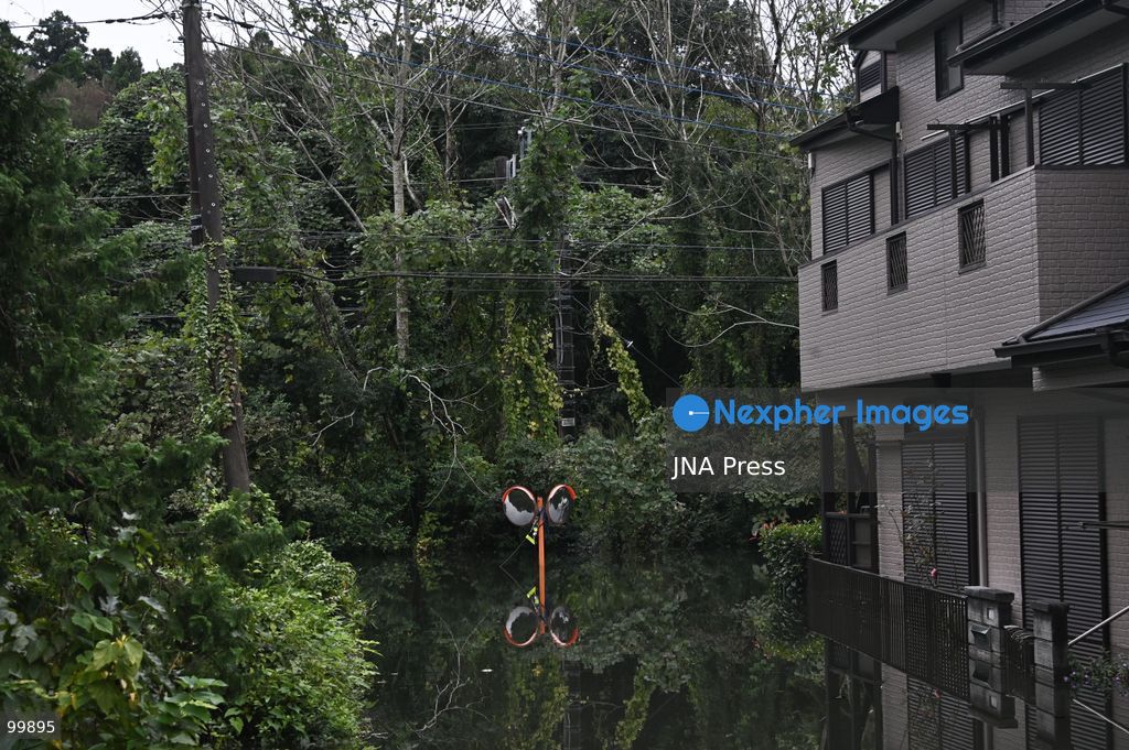 CHIBA, JAPAN, OCTOBER 1, 2026: Flooding affects a residential area in Chiba after heavy rains associated with Typhoon No. 25 caused a long-neglected embankment to collapse, blocking a drainage channel. With another typhoon approaching, residents face continued flooding as restoration work has yet to be completed. Photo by Soichiro Koriyama / JNA Press. (Photo by Soichiro Koriyama/JNA Press via Nexpher Images)