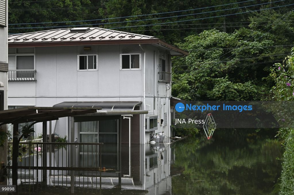 CHIBA, JAPAN, OCTOBER 1, 2026: Flooding affects a residential area in Chiba after heavy rains associated with Typhoon No. 25 caused a long-neglected embankment to collapse, blocking a drainage channel. With another typhoon approaching, residents face continued flooding as restoration work has yet to be completed. Photo by Soichiro Koriyama / JNA Press. (Photo by Soichiro Koriyama/JNA Press via Nexpher Images)