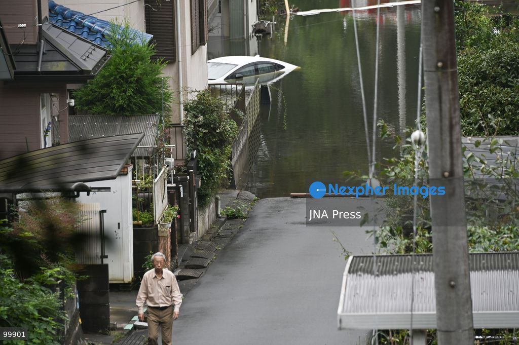 CHIBA, JAPAN, OCTOBER 1, 2026: Flooding affects a residential area in Chiba after heavy rains associated with Typhoon No. 25 caused a long-neglected embankment to collapse, blocking a drainage channel. With another typhoon approaching, residents face continued flooding as restoration work has yet to be completed. Photo by Soichiro Koriyama / JNA Press. (Photo by Soichiro Koriyama/JNA Press via Nexpher Images)