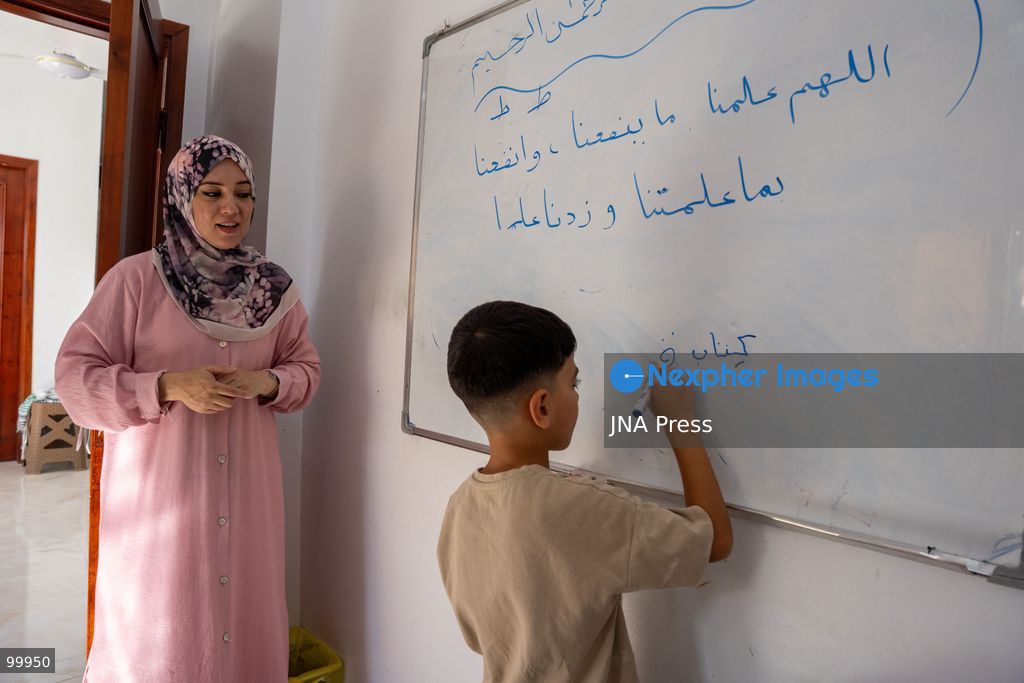 AL-ARISH, NORTH SINAI, EGYPT, OCTOBER 1, 2026: Palestinian children attend Al-Amal School in Al-Arish, North Sinai, which provides education based on the Palestinian curriculum for Palestinian students living in the city. The school also provides psychological support to students as the new academic year begins in Gaza. Hadeel Zaab, a school official, said she left Gaza for Egypt during the war and began teaching Palestinian children who arrived in Al-Arish, helping them prepare for Palestinian curriculum examinations while providing psychological support. Photo by Mohamed Arafat / JNA Press. (Photo by Mohamed Arafat/JNA Press via Nexpher Images)